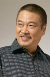 Director Ching Monta（吴孟达饰演）